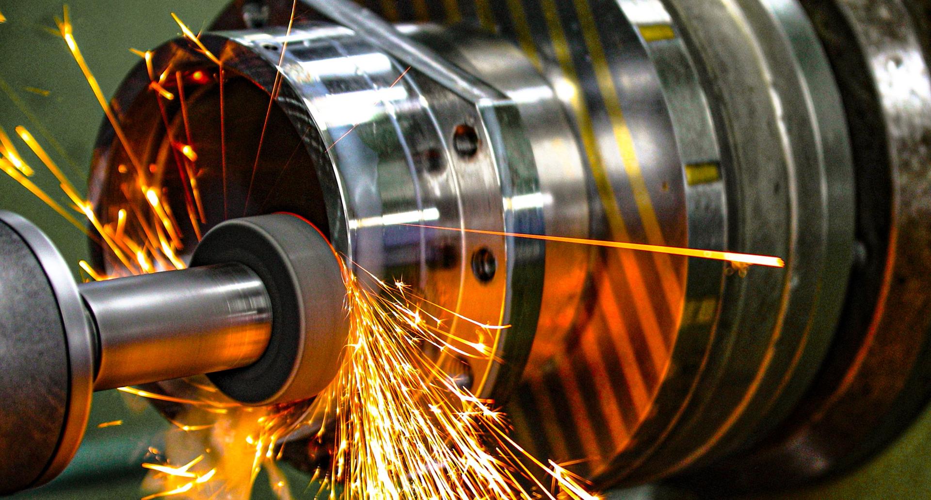 Finishing metal working on high precision grinding machine in workshop