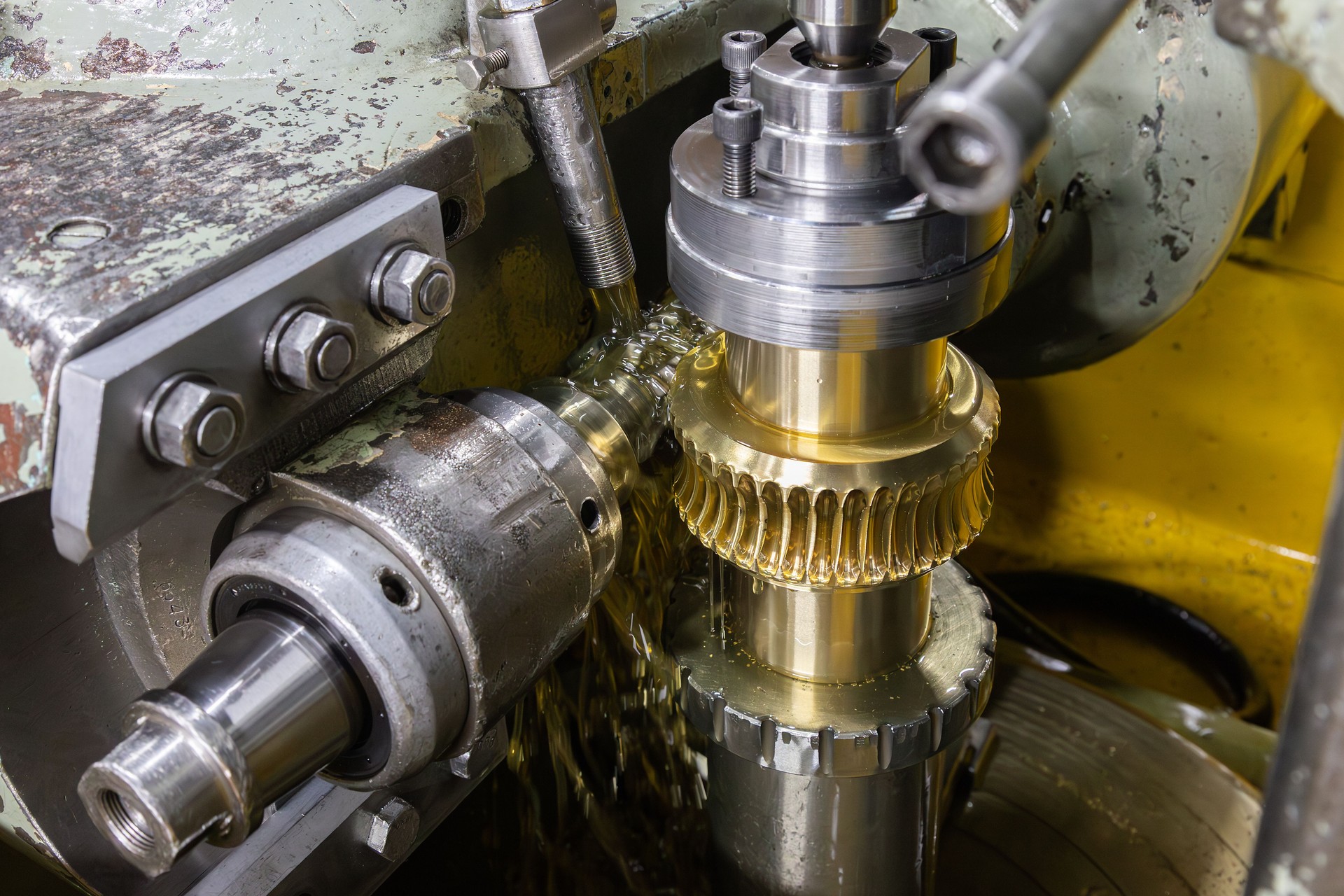 Tooth Gear Manufacturing in Gear Hobbing Machine , Bronze Alloy Material , Stock Photo